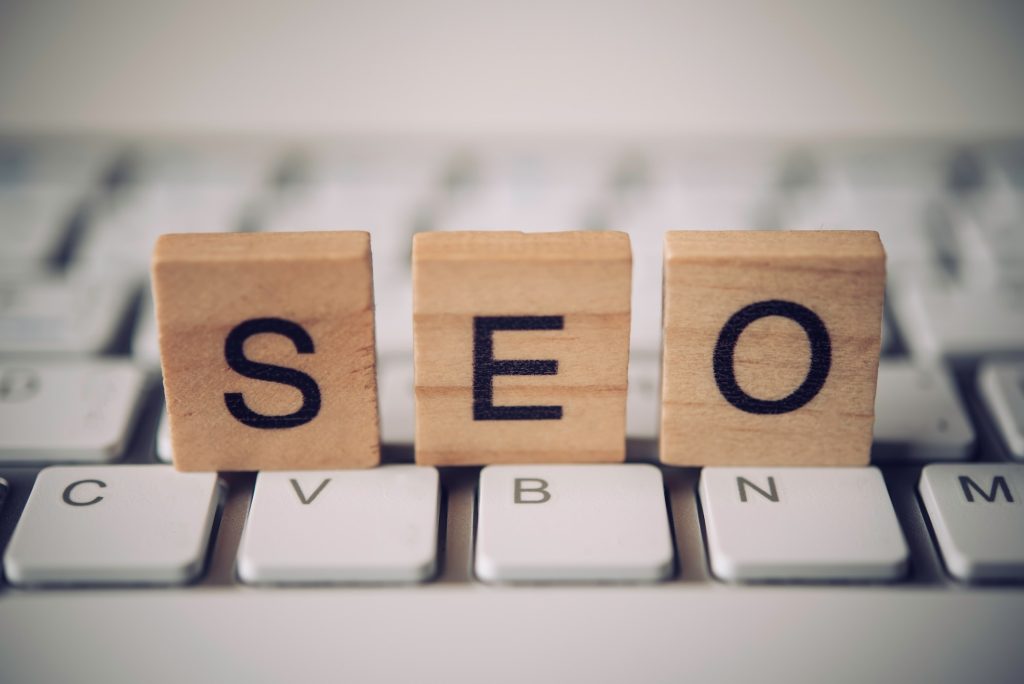 The words "S E O" on the keyboard - Search Engine Optimization Concept